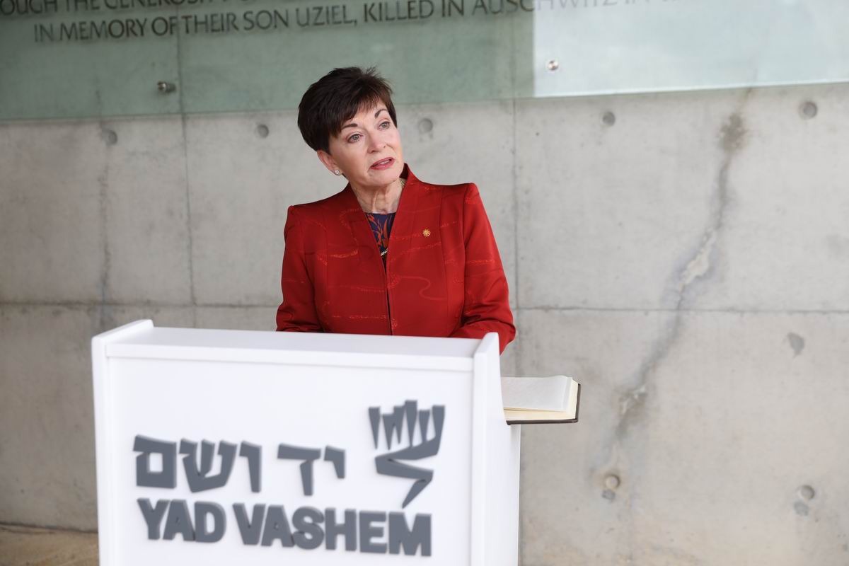 Dame Reddy read aloud her comments in the Yad Vashem Guest Book.